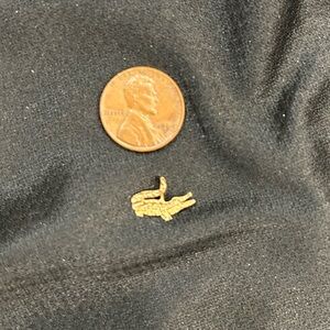 14k gold alligator charm .33 gr.
Loop on back for chain